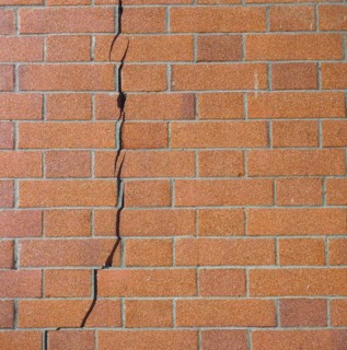 Cracked brick wall
