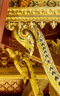 Gold-coloured swan-neck-shaped decoration in the Siamese Temple Sala-Thai II in the spa garden Bad Homburg vor der Hoehe