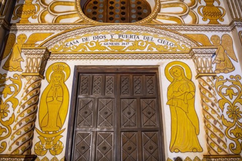Front portal of the mission of Concepcion at night