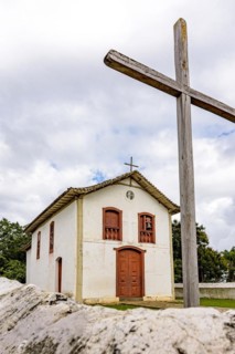 Facade of small historic church 17th century colonial style church in the countryside of Minas Gerais state