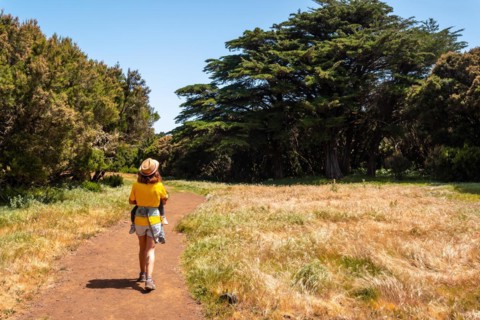 A mother with her son enjoying on the La Llania trekking trail in El Hierro