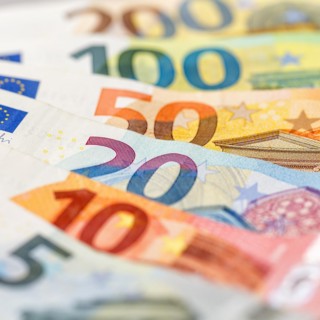 Euro banknotes save money finances background pay pay banknotes square in Stuttgart
