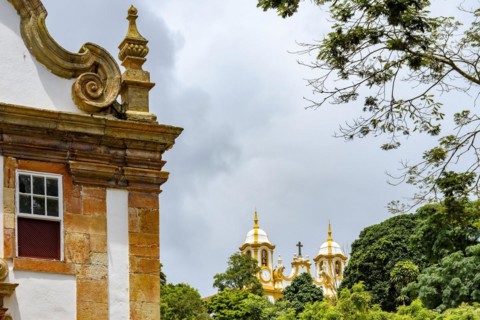 Churches and historic buildings among the vegetation of the city of Tiradentes in Minas Gerais