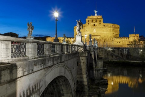 Evening twilight over Castel Sant'Angelo and the Aelius Bridge over the Tiber
