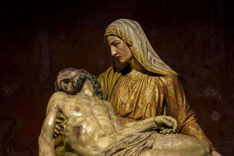 Representation of Jesus on the lap of his mother Mary in Brazilian baroque sacred art from the 18th century present in the interior of the rich churches of Ouro Preto in Minas Gerais
