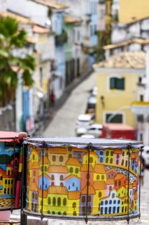Decorated drums with the streets and slopes of the famous and historic Pelourinho district in Salvador in the background