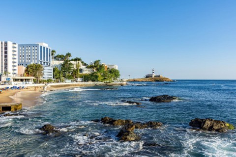 Famous Barra beach and lighthouse on the seafront of Salvador in Bahia