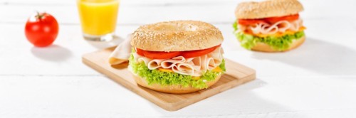 Bagel sandwich for breakfast topped with chicken ham Panorama in Stuttgart