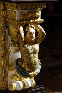 Column base with sculpture inside a baroque church from the 18th century in the Pelourinho neighborhood in the city of Salvador