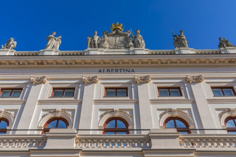 Golden Crown and Marble Statues on the Roof of the Albertina