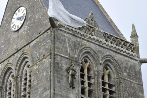 Parachute Memorial in honour of paratrooper John Steele who was caught on the church spire during D-Day