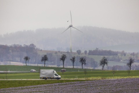 Cars driving along a country road in Meuselwitz