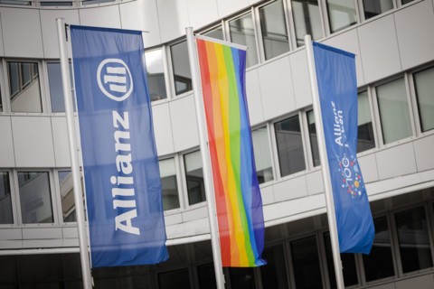 Flags of Allianz stand in front of their location in Berlin. 04.02.2022.