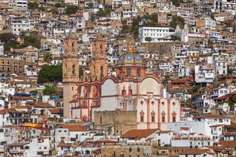View over the colonial city centre of Taxco de Alarcon and the 18th century Church of Santa Prisca