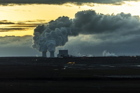 The Schwarze Pumpe coal-fired power plant stands out against the rising sun