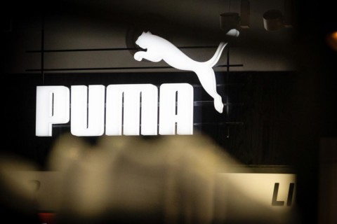 The logo of the sporting goods manufacturer PUMA in a branch in Berlin