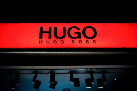 Logos of the fashion manufacturer HUGO Boss at a branch in Berlin
