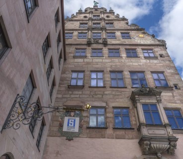 Historical nose sign on a residential and commercial building