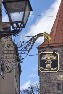 Historical nose sign behind the Neutorturm