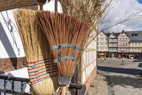 Handmade brooms at workshop of brush maker