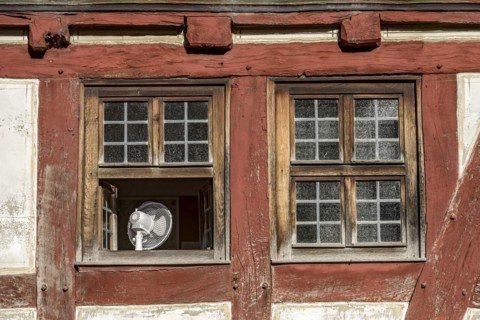 Window with fan to cool the room in hot weather