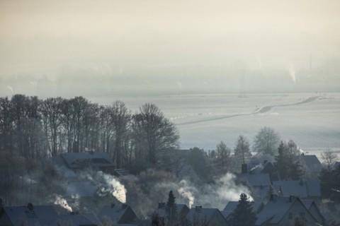 Smoke is visible from the chimneys on an icy morning in Koenigshain