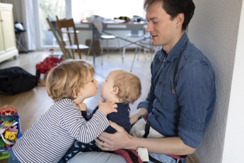 Subject: Father with two children aged nine months and three years.