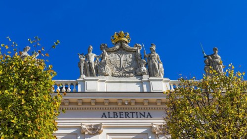 Golden Crown and Marble Statues on the Roof of the Albertina