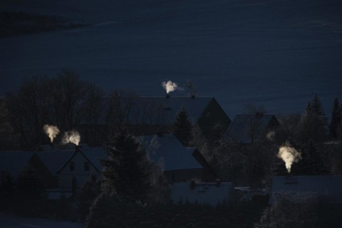 Smoke is visible from the chimneys on an icy morning in Koenigshain