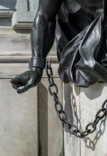 Detail photo of the chained warriors at the base of the equestrian statue of Frederick William of Brandenburg