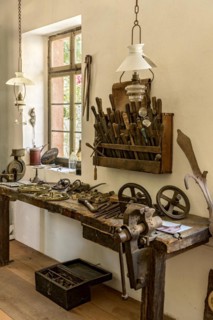Old workbench with vice and tools