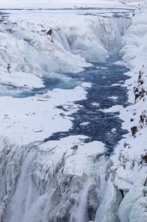 Gullfoss waterfall in the snow in winter located in the canyon of Hvita river