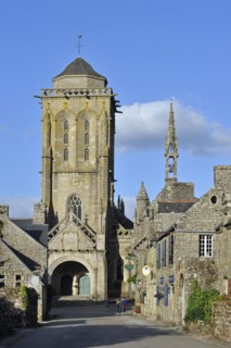 Old picturesque houses and the Saint Ronan church at Locronan