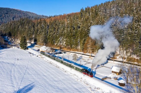 Pressnitztalbahn railway steam train steam locomotive in winter aerial view in Schmalzgrube