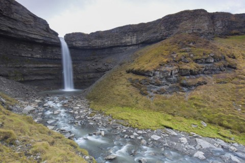 Waterfall Hemsilfossen on the Hemsil river at Ekmanfjorden