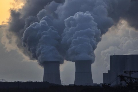 The Schwarze Pumpe coal-fired power plant stands out against the rising sun
