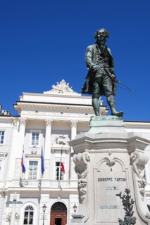 Guiseppe Tartini Square with monument in front of the Town Hall