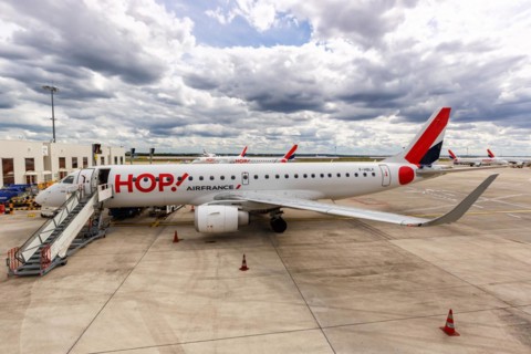 An Embraer 190 aircraft of Hop! Air France with registration F-HBNC at Paris Charles de Gaulle Airport