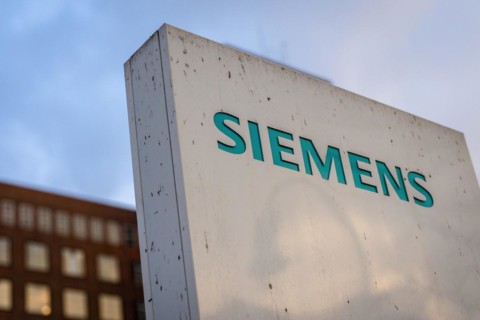 A Siemens company sign in front of a branch office in Siemensstadt in Berlin