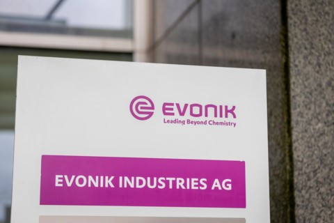 A sign of the evonik company at their headquarters in Essen