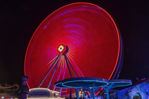 Illuminated flower wheel at the Prater