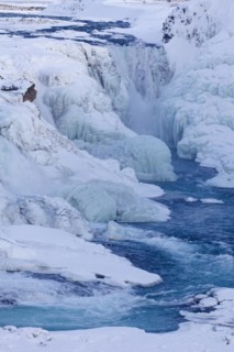Gullfoss waterfall in the snow in winter located in the canyon of Hvita river