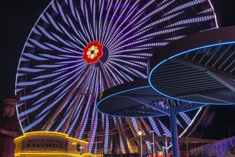 Illuminated flower wheel at the Prater