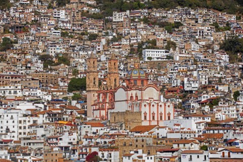 View over the colonial city centre of Taxco de Alarcon and the 18th century Church of Santa Prisca