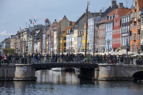 Tourists crossing bridge