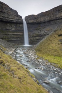 Waterfall Hemsilfossen on the Hemsil river at Ekmanfjorden