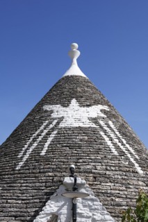 Trulli with symbol on the roof