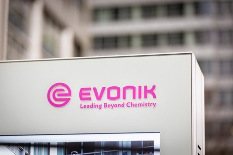 A sign of the evonik company at their headquarters in Essen