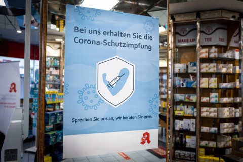 A poster in a pharmacy advertising the possibility to be vaccinated at pharmacies in Duesseldorf