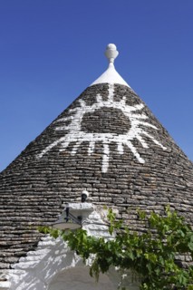 Trulli with symbol on the roof
